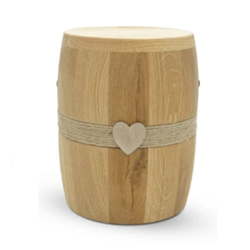 wooden urn with heart in center. Wooden heart urn